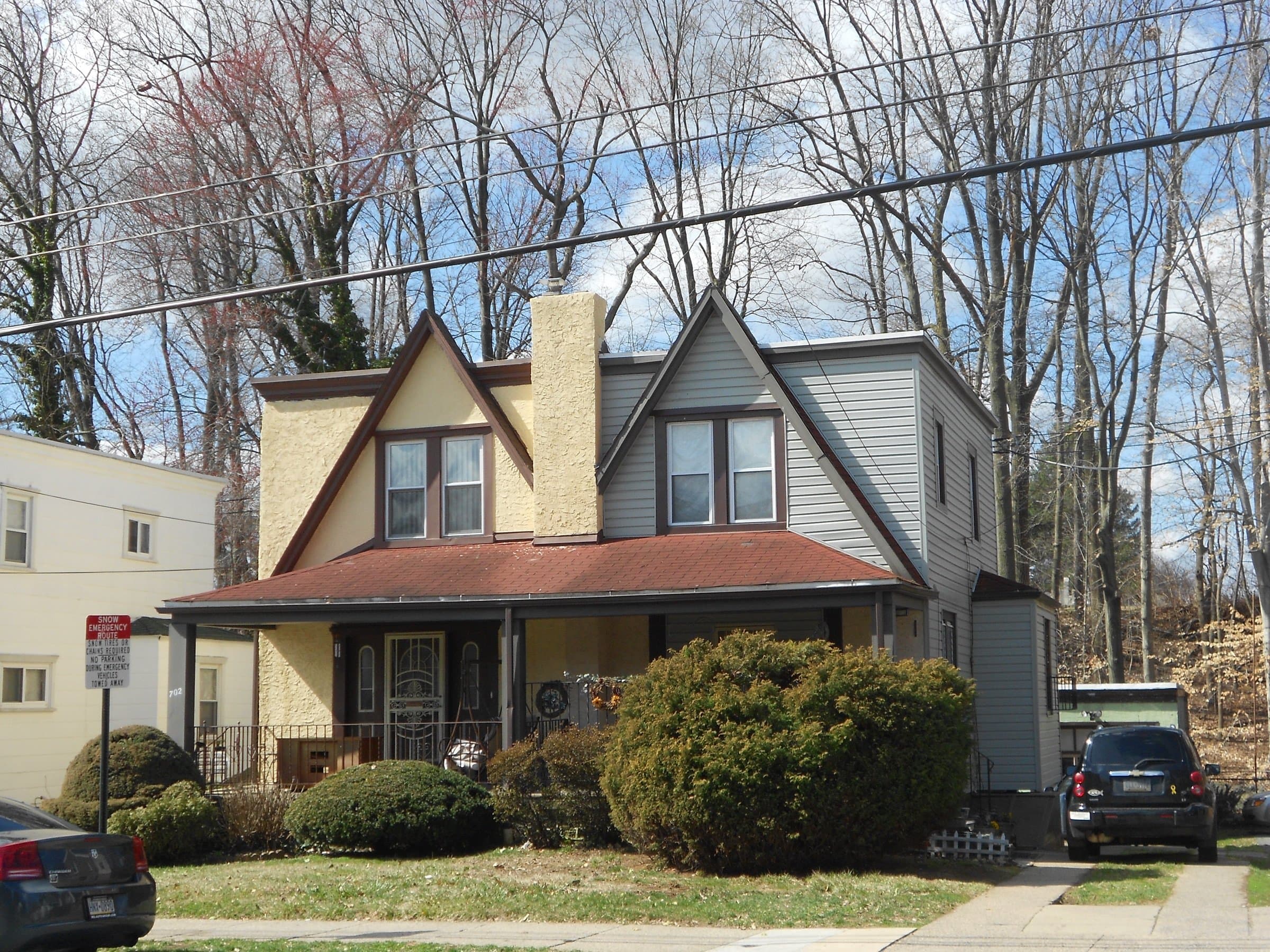 A classic twin home with a front porch in Yeadon, Pennsylvania